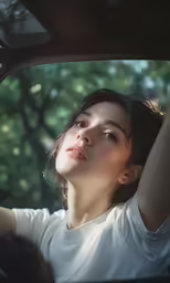 a woman is posing for the camera while in her car