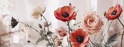 flowers in a vase with butterflies on it