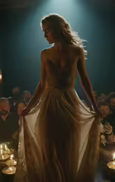 a woman is standing in the dark looking down