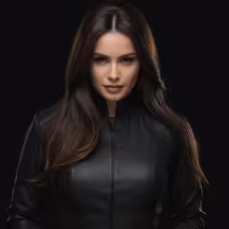 an attractive woman wearing black leather in front of a black background