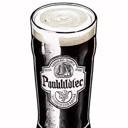 a pint glass with some black and white stuff in it