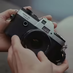 there is a small camera in the hands
