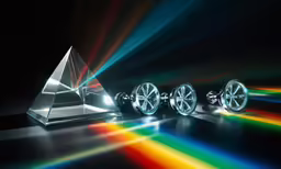 a pyramid has colorful lights coming out of it