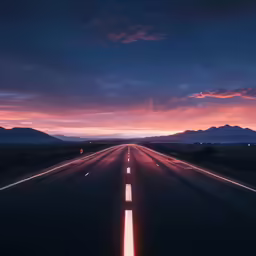the horizon shows a bit as dusk is over the road