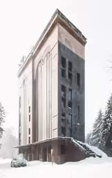 an image of a hotel building in the snow