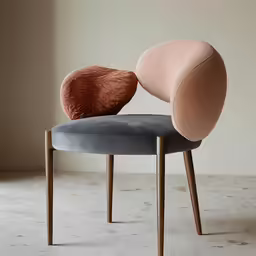 the pink and blue chair are arranged on wood legs