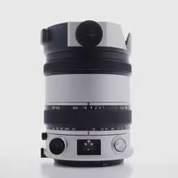 the front view of a large lens on a table