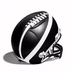 the black and white helmet is sitting on a table