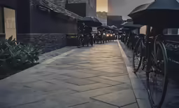 there are many bikes parked outside of this building