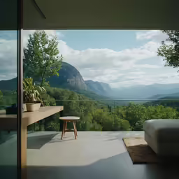 a bedroom with a mountain view overlooking it and a chair