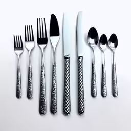 the utensils are lined up against each other