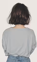 a woman in a grey t - shirt with a white background