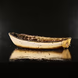 an image of bananas in a boat made from fruit