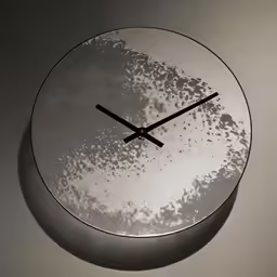 a circular clock that has something all over it