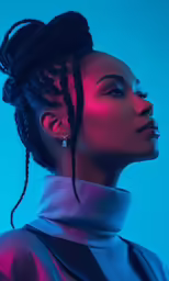 a young woman with a ponytail wearing an elegant dress