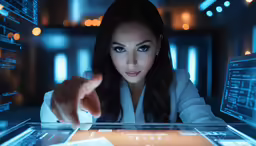 a woman points out her tablet in the dark