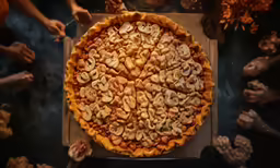 a table topped with a pie filled with mushrooms