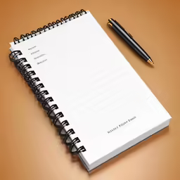 a notebook with a black pen on top of it