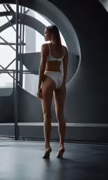 a woman in a white bikini is looking over her shoulder