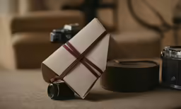a folded piece of paper on a camera lens