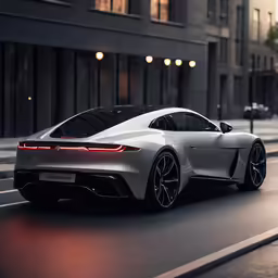a gray and black sports car driving down the road