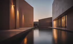 a large pool next to some very tall building