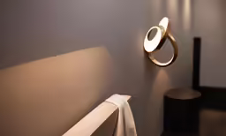 a light on the wall is shining from below