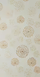 a wall paper with small gold dots on it