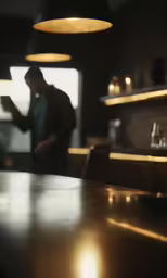man in a bar reading on his phone