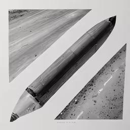 a pencil in the middle of a black and white photograph