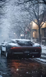 a car driving down a street in the snow