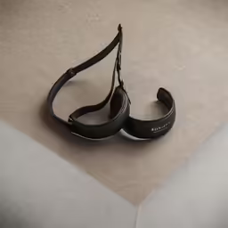 headphones on top of a piece of floor