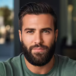 a man in green shirt looking into the camera