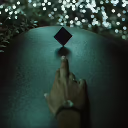there is a man that has his fingers on something