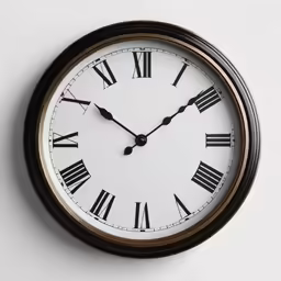 a clock with roman numerals is hanging off the wall