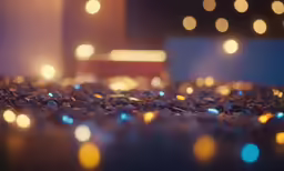 a blurry photo of the ground in front of lights