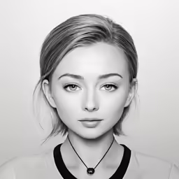 a black and white photo of a woman with blonde hair