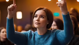 a woman with a peace sign in the air
