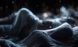 the woman is lying down on the bed