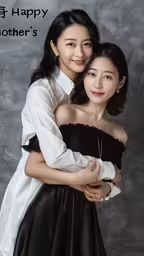 an old photograph of two asian women hugging,this is an image of a pair of woman hugging each other