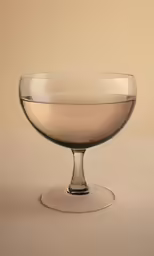 glass vase with light beige liquid inside