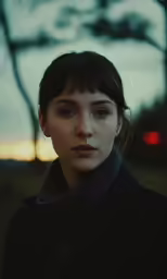 a close up of a person wearing a jacket