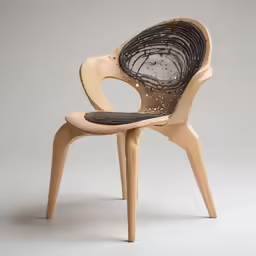 a wood chair has some sort of abstractal fabric in it
