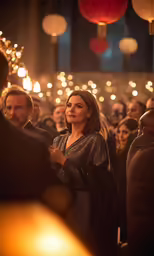 a woman is standing in the middle of an audience