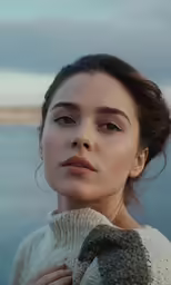 the girl in the picture looks off into the distance
