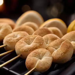 different kinds of breads on skewers for sale
