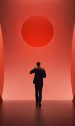 a man in a suit walks by a red room