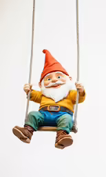an elf - like gnome hanging on to a swing