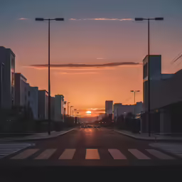 sunset in the background from the street with sun setting