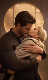 a man and a woman are embracing each other in a photo